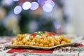 Sweet Italian Struffoli, small balls fried and dipped in honey, Neapolitan dessert of Christmas holidays