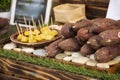 Sweet japanese potato roasted and grilled for sale thai people and travelers foreigner at street market in Nakhon Ratchasima, Royalty Free Stock Photo