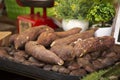 Sweet japanese potato roasted and grilled for sale thai people and travelers foreigner at street market in Nakhon Ratchasima, Royalty Free Stock Photo