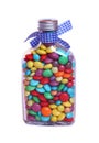 Sweet jar full of smarties on a white background Royalty Free Stock Photo