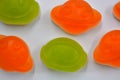 Sweet jelly candies, sweets in the form of aliens space rockets, astronauts, alien ships and planet, asteroids.