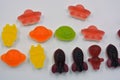 Sweet jelly candies, sweets in the form of aliens space rockets, astronauts, alien ships and planet, asteroids.