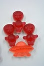 Sweet jelly candies, sweets in the form of aliens space rockets, astronauts, alien ships and planet, asteroids.