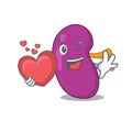 A sweet kidney cartoon character style holding a big heart