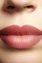 Sweet kiss. Perfect natural lip makeup. Close up macro photo with beautiful female mouth. Plump full lips Royalty Free Stock Photo