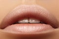 Sweet kiss. Perfect natural lip makeup. Close up macro photo with beautiful female mouth. Plump full lips Royalty Free Stock Photo