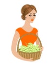 A sweet lady is holding a basket with grapes. Ripe and sweet white berries. The girl is young and beautiful. Vector illustration