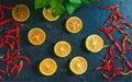 Seasonal fruit sweet lemon with red chillis. Royalty Free Stock Photo