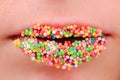 Sweet lips in the color sugar balls Royalty Free Stock Photo