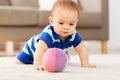 Sweet little asian baby boy playing with toy ball Royalty Free Stock Photo