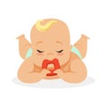 Sweet little baby with closed eyes lying on his stomach teething and chewing teethers, colorful cartoon character vector