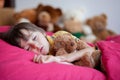 Sweet little boy, sleeping in the afternoon with his teddy bear Royalty Free Stock Photo