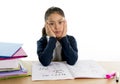 Sweet little girl bored under stress with a tired face expression Royalty Free Stock Photo