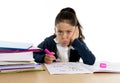 Sweet little girl bored under stress upset and moody with a tired face expression Royalty Free Stock Photo