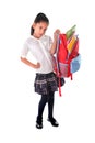 Sweet little girl carrying very heavy backpack or schoolbag full of school material