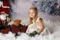 Sweet little girl with christmas decorations, playing Royalty Free Stock Photo
