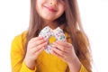 Sweet little girl eating white donut