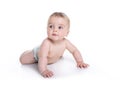 Sweet little girl on the floor of studio white background Royalty Free Stock Photo