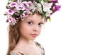 Sweet little girl with floral head wreath. Royalty Free Stock Photo