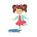 Sweet little girl jumping and splashing through the puddle wearing rubber boots cartoon vector Illustration Royalty Free Stock Photo