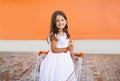 Sweet little girl in shopping cart Royalty Free Stock Photo