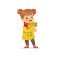 Sweet little girl in warm clothing holding autumn leaves, cute kid enjoying fall, autumn kids activity vector