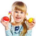 Sweet little girl with yellow Easter egg
