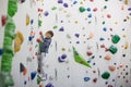 Sweet little preschool boy, climbing wall indoors Royalty Free Stock Photo