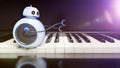 Sweet little robot runs over piano key