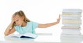Sweet little schoolgirl feeling exhausted and stress by load of homework and schoolwork Royalty Free Stock Photo