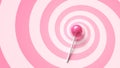 Sweet lollipop on stick on pink spiral background