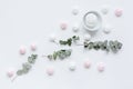 Sweet marsh-mallow and flowers on woman white desk background top view