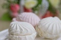 Sweet marshmallows and bouquet Royalty Free Stock Photo