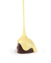 Sweet milk sauce is poured on a chocolate bar Royalty Free Stock Photo