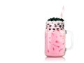 Sweet milk tea with bubbles in clear glass and drinking straws on pink background. Thai milk with black pearls.  Clipping path Royalty Free Stock Photo