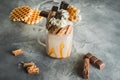 Sweet milkshake drink with dripping sauce, cookie Royalty Free Stock Photo