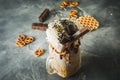 Sweet milkshake drink with dripping sauce, cream Royalty Free Stock Photo