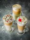 Sweet milkshake drinks with whipped cream, close up view