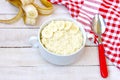 Sweet millet porridge with banana in white bowl