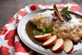 Sweet millet porridge with honey, apples and grated coconut