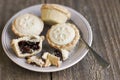 A sweet mince pie, a traditional rich festive food, on a plate w Royalty Free Stock Photo