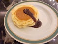 Sweet mini pancakes with chocolate syrup Royalty Free Stock Photo