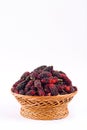 Sweet mulberries in brown basket on white background healthy mulberry fruit food isolated Royalty Free Stock Photo