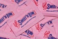 Sweet  `N Low packets scattered loosely, full frame macro image. Royalty Free Stock Photo