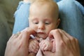 Sweet Newborn Baby Girl Holding Father's Hands Royalty Free Stock Photo