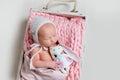 Sweet newborn baby girl sleeping and embracing her toy Royalty Free Stock Photo