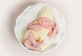 Sweet newborn baby in hat and panties sleeping on the shell Royalty Free Stock Photo