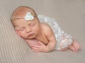 Sweet newborn girl sleeping on her hand Royalty Free Stock Photo