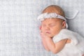 Sweet newborn girl sleeping on her hands Royalty Free Stock Photo