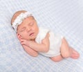 Sweet newborn girl sleeping on her hands Royalty Free Stock Photo